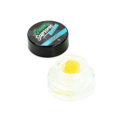 Green Supreme Diamonds Rockstar strain THCA concentrate in a clear jar with black lid, 1g