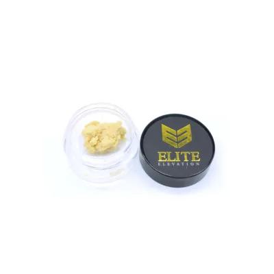 Elite Elevation budder concentrates in open glass container sunset sherbet strain